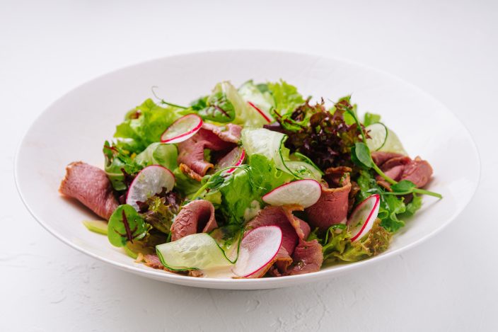 roast beef salad with green mix on plate 2023 08 17 11 13 33 utc scaled